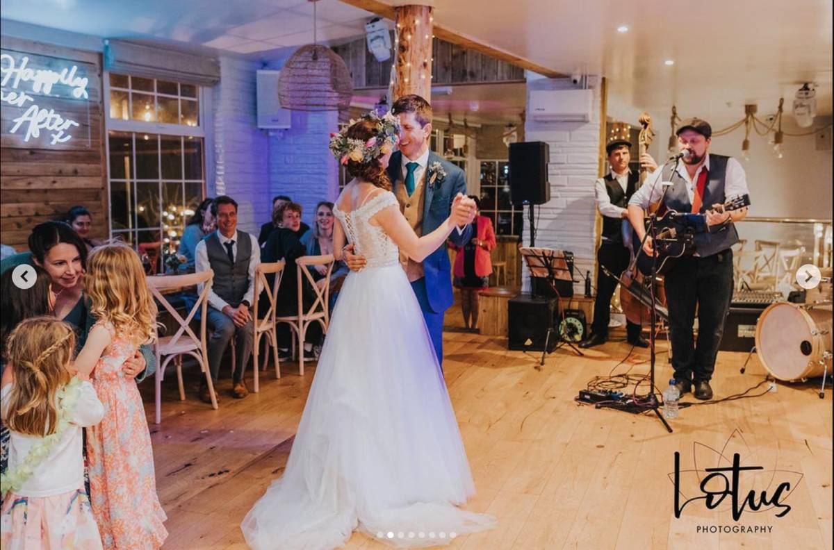 The Southern Sons Singer at a Wedding Photo of singer and bride and groom dancing to The Southern Sons vocalist performing their first dance