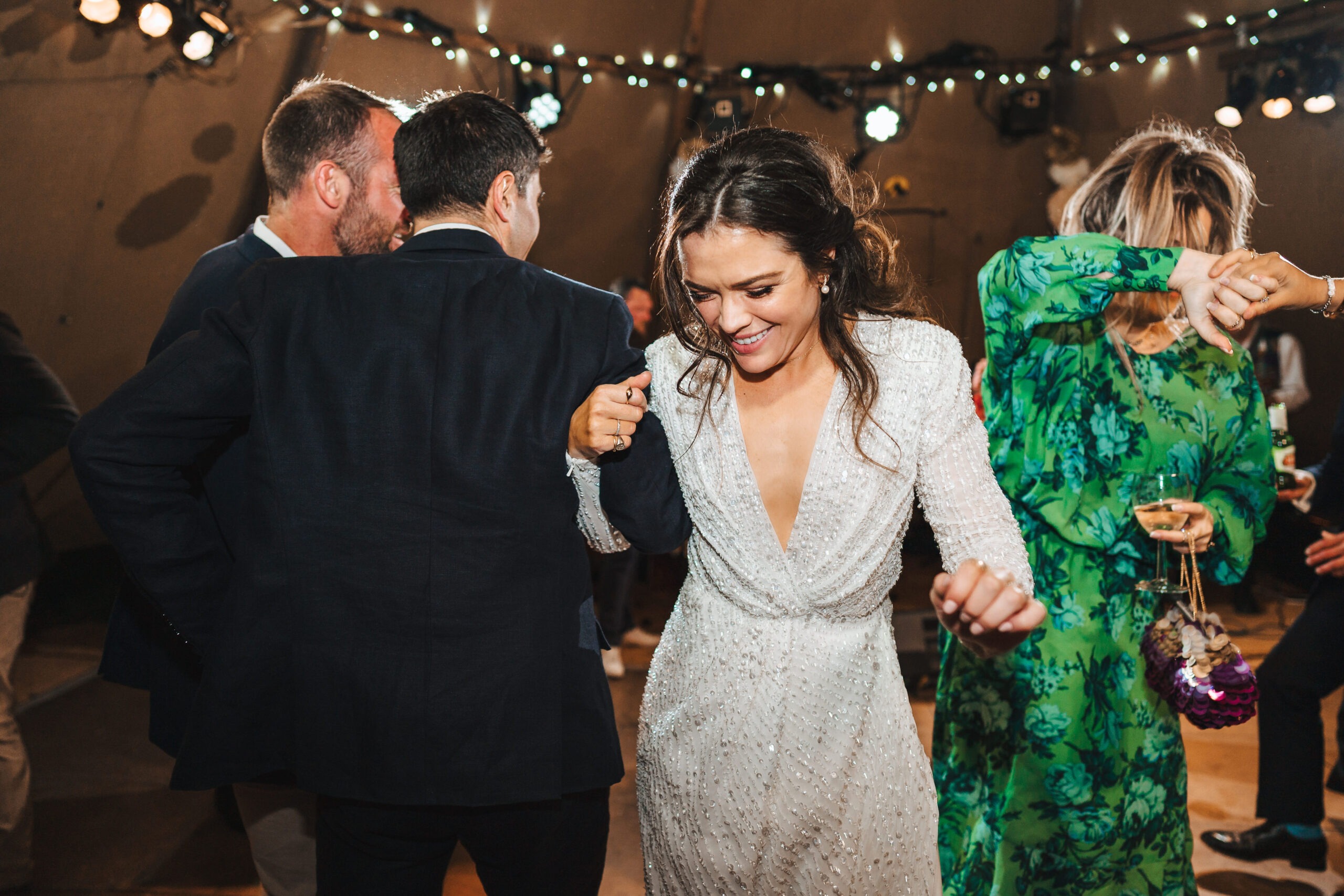 Dancing at Southern Sons event Picture of lady and man dancing at live music event in white dress and man in black suit